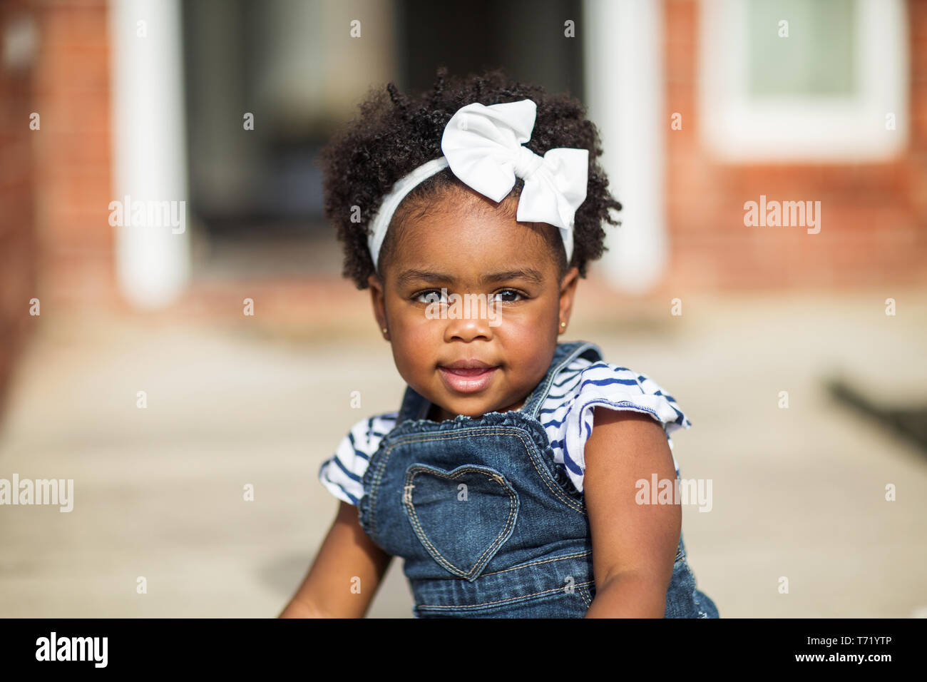 Happy African Amereican little girl laughing and smiling Stock Photo ...