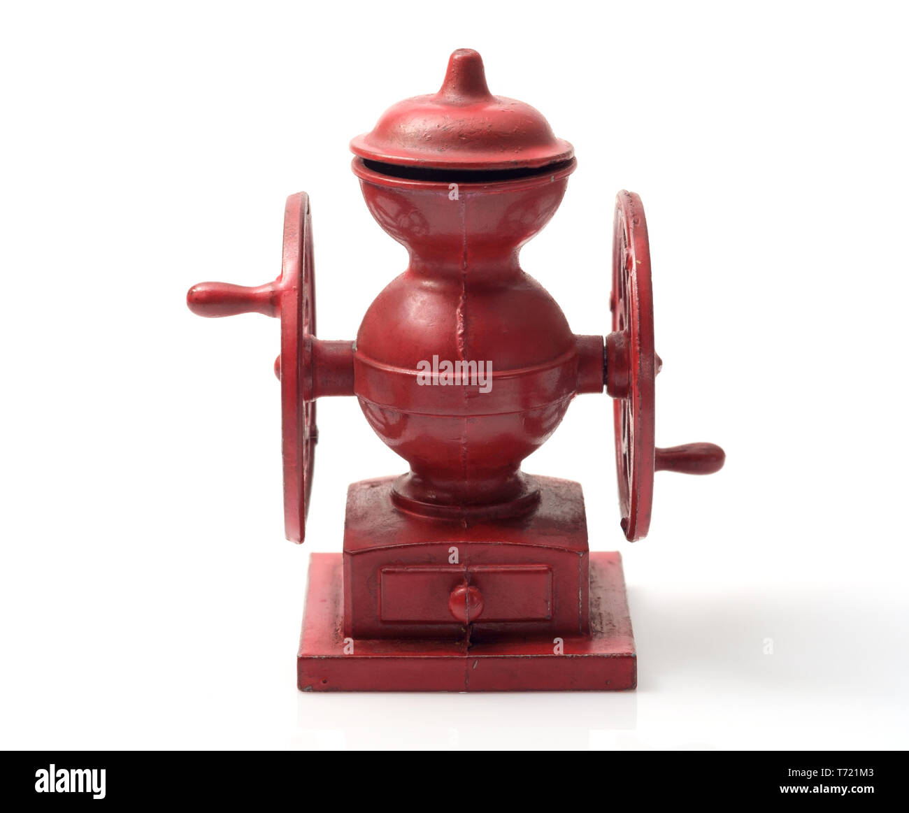 Vintage toy, coffee grinder on white background Stock Photo Alamy