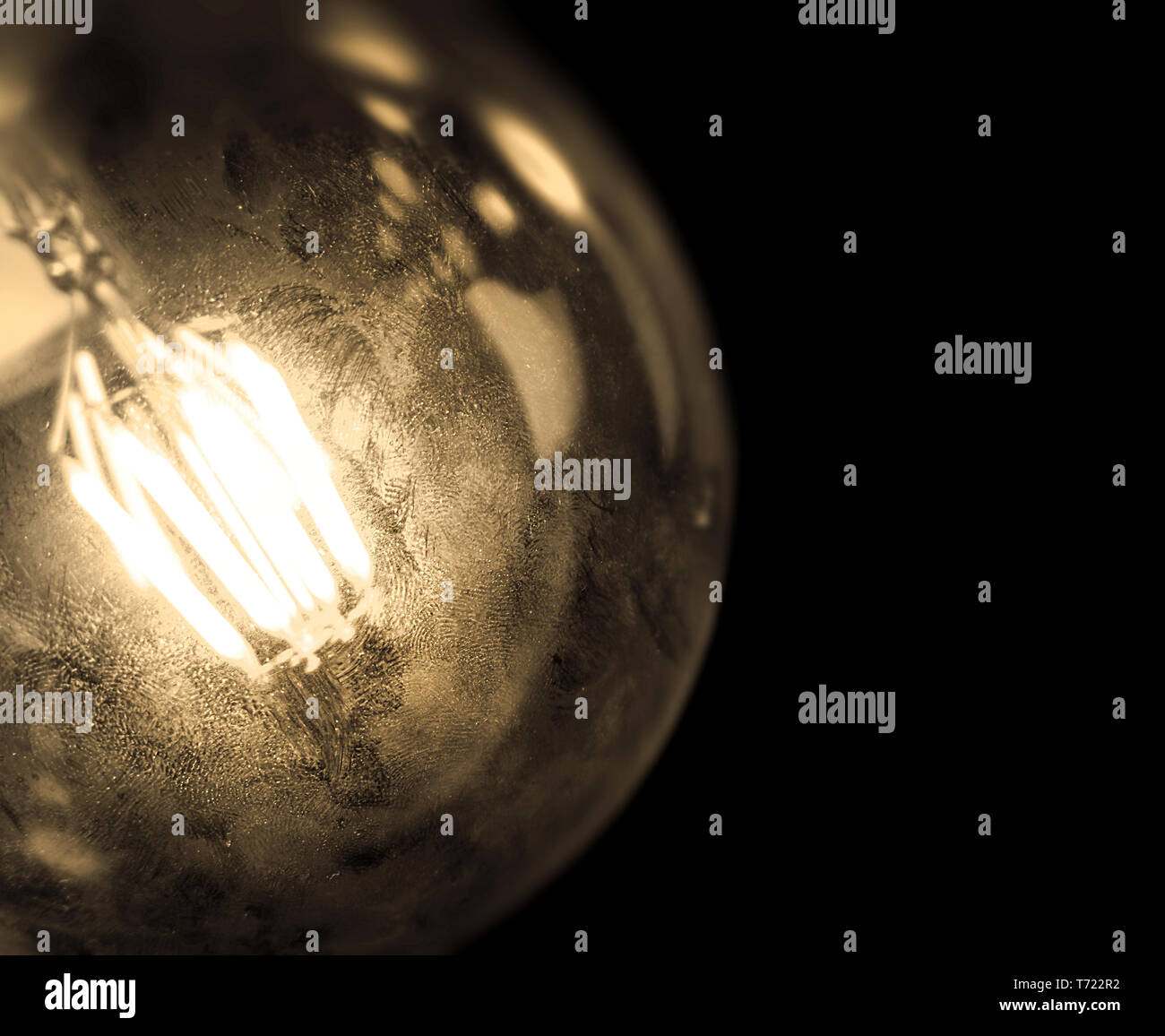 Incandescent filaments light bulb Stock Photo Alamy