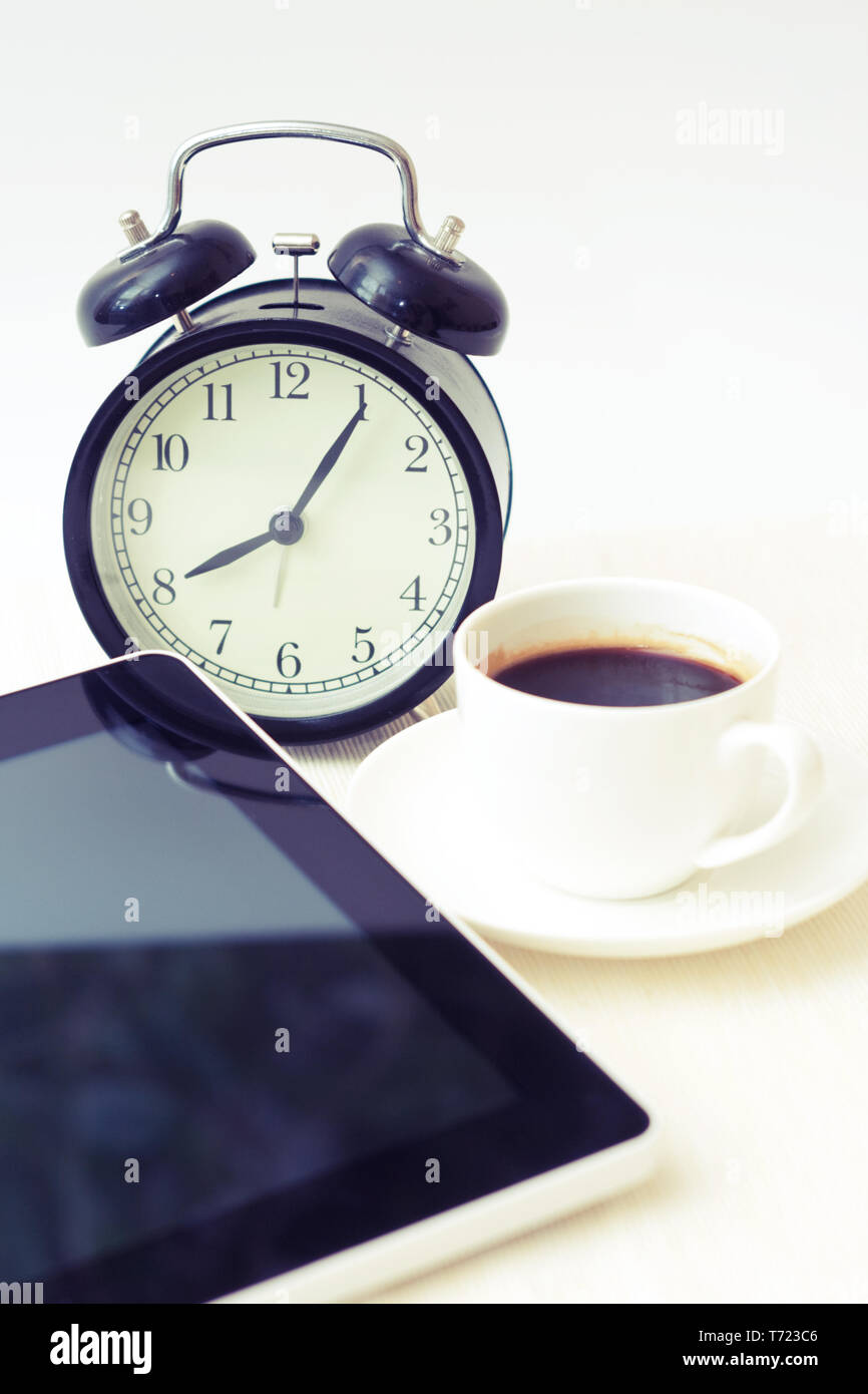 Coffee cup and alarm clock Stock Photo Alamy