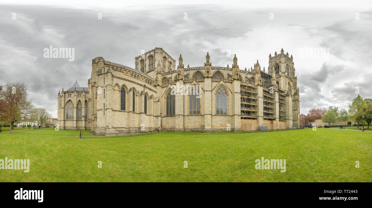Dean's park and the north exterior of the medieval cathedral (minster) at York, England, on an overcast spring day. Stock Photo