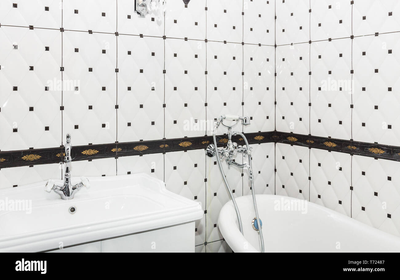 Bathroom Interior In Art Deco Style Classic Bathroom And Washbasin In Combination With Beautiful Ceramic Tiles Stock Photo Alamy