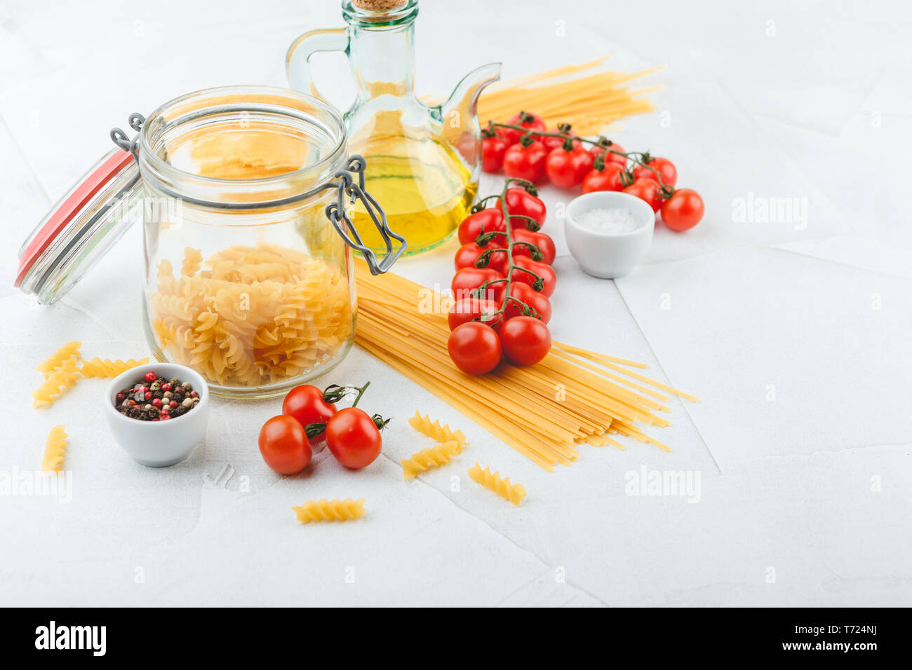 Italian Pasta with tomatoes, oil Stock Photo