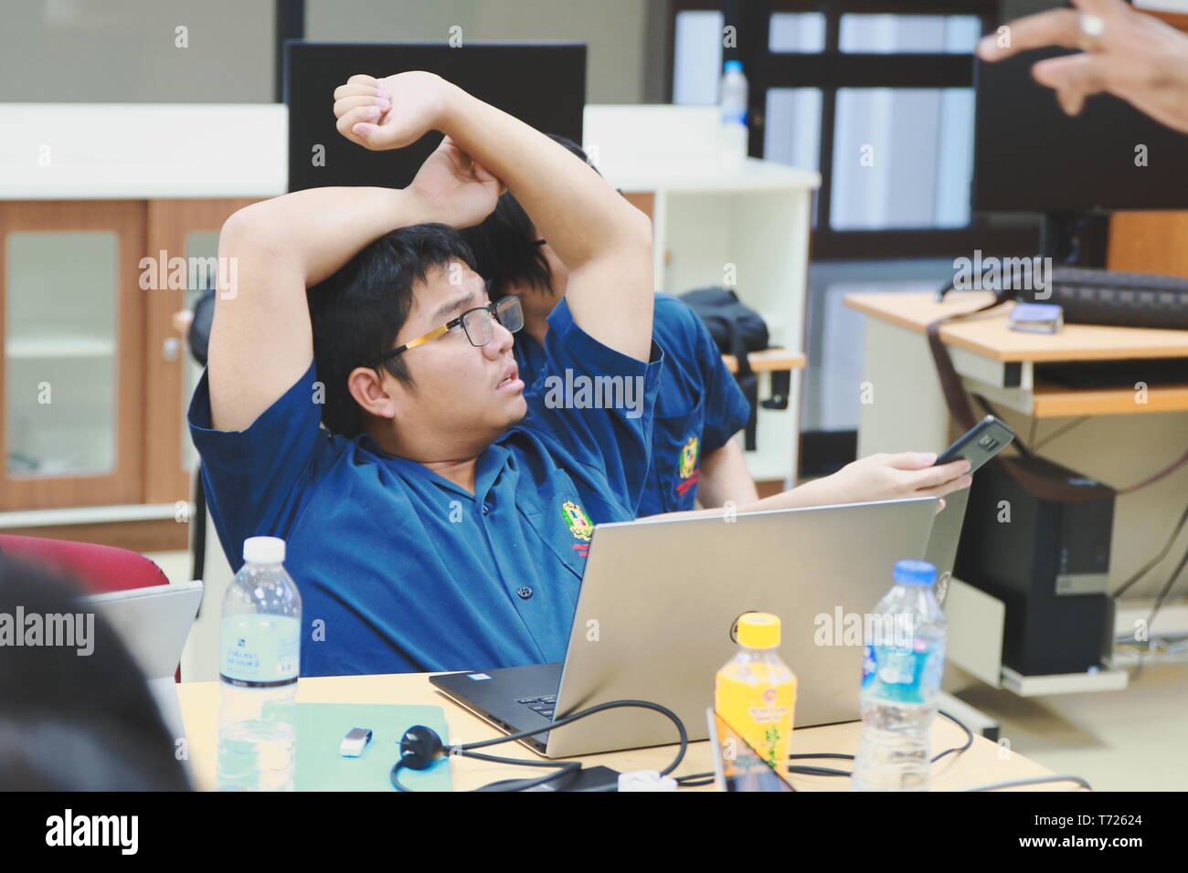 Asian office stretch hi-res stock photography and images - Alamy