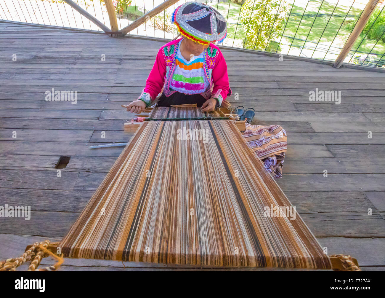 traditional weaving of alpaca woo with frame Arequipa Peru Stock Photo