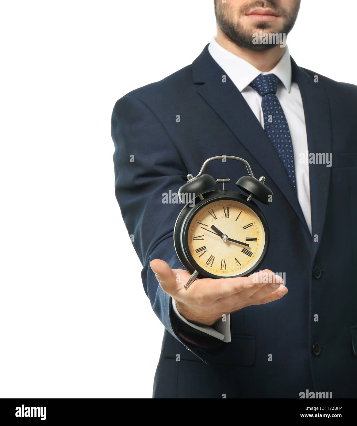 Man holding clock on white background. Time management concept Stock ...