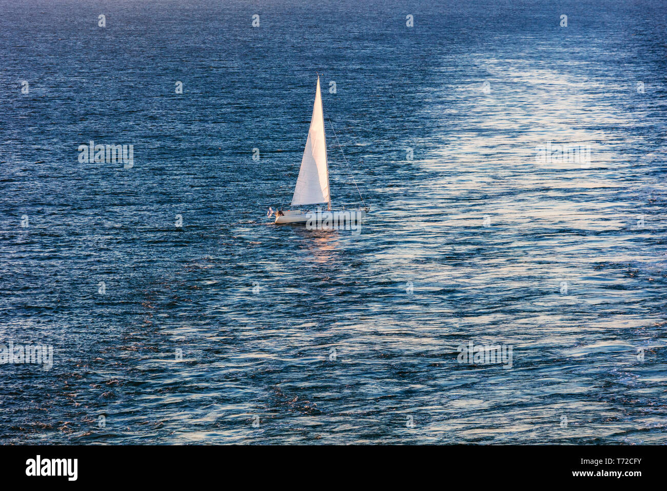 yacht with white sails in sea Stock Photo - Alamy