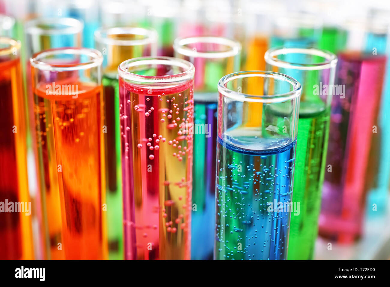 Many test tubes with colorful liquids, closeup Stock Photo - Alamy