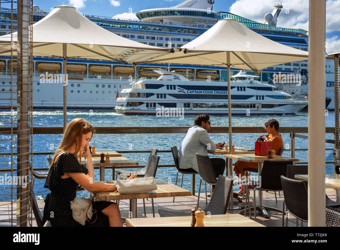 Bars and restaurants in the promenade Circular Quay of Harbour Bridge in Sydney, Australia Stock Photo