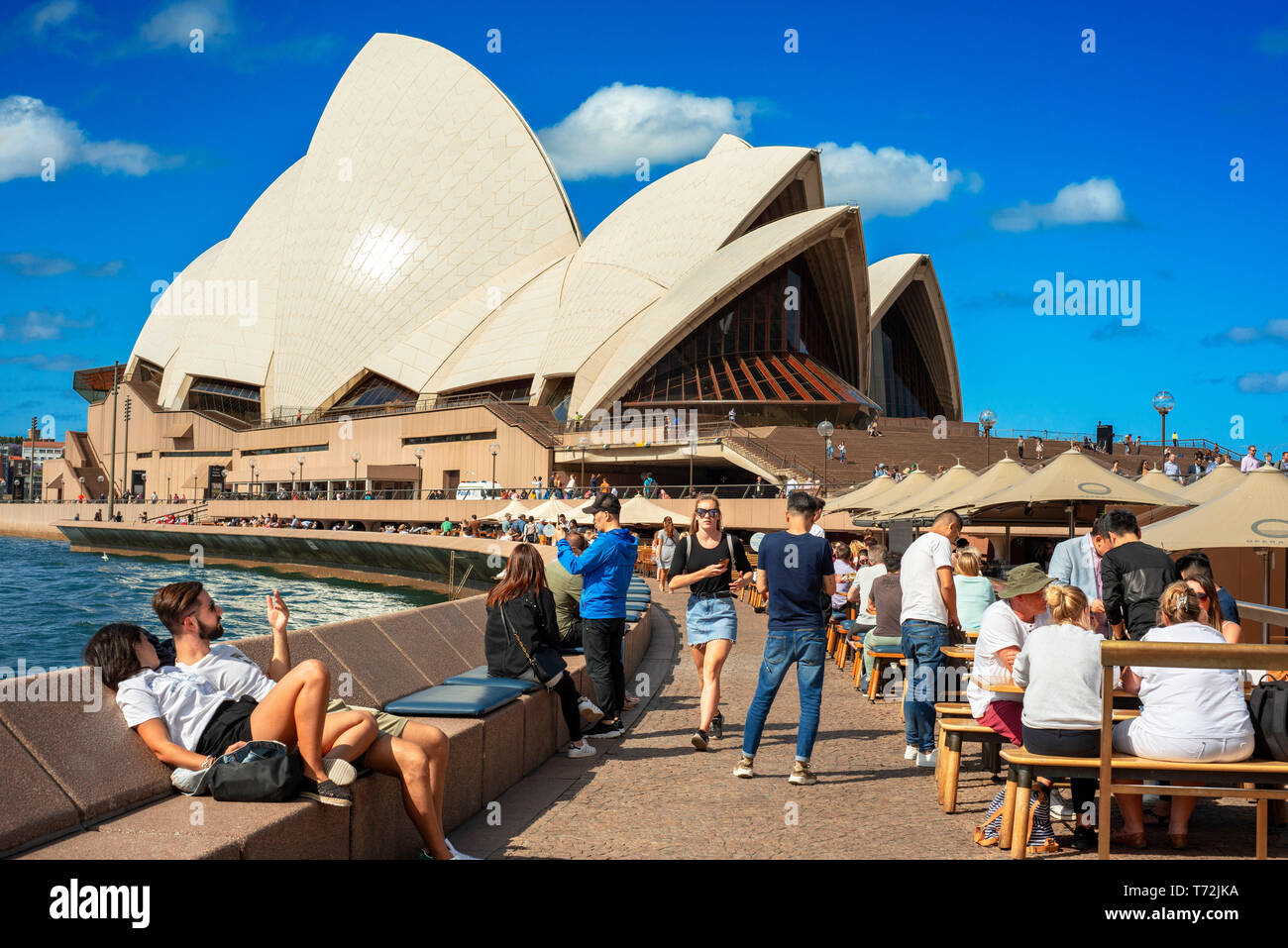 Bars and restaurants in the promenade Circular Quay and Opera House in Sydney, Australia Stock Photo