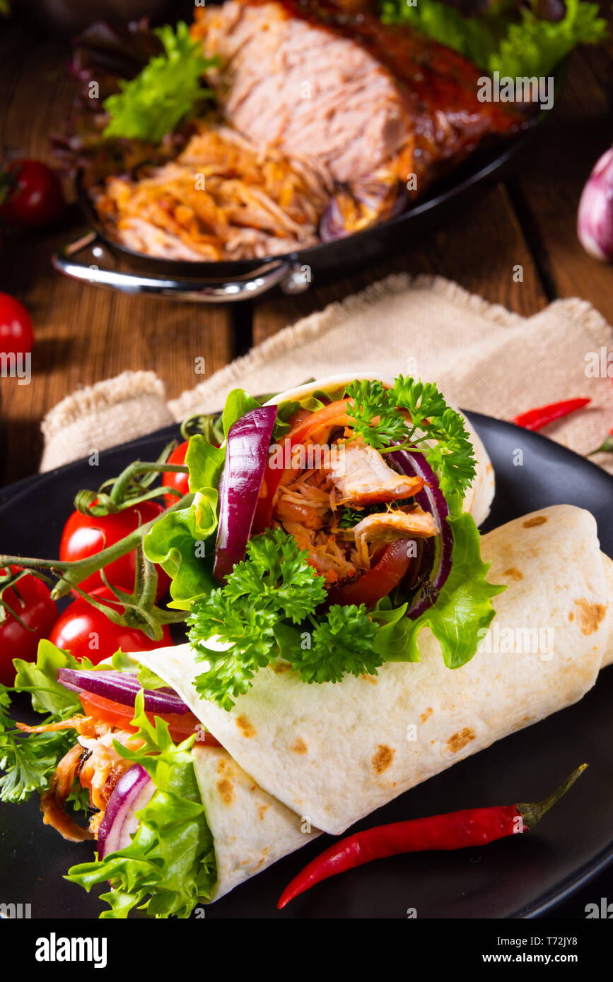 Tasty Point Wraps Tasty wraps filled with pulled pork and salad Stock Photo - Alamy