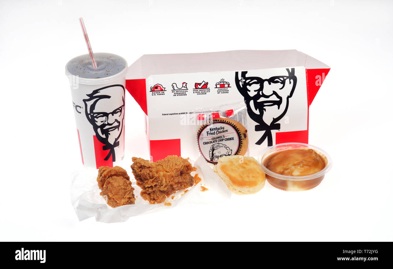 Kentucky Fried Chicken, KFC, box meal $5 Fill Up with a crispy fried chicken thigh and drumstick, mashed potatoes with gravy, biscuit, cookie & drink Stock Photo