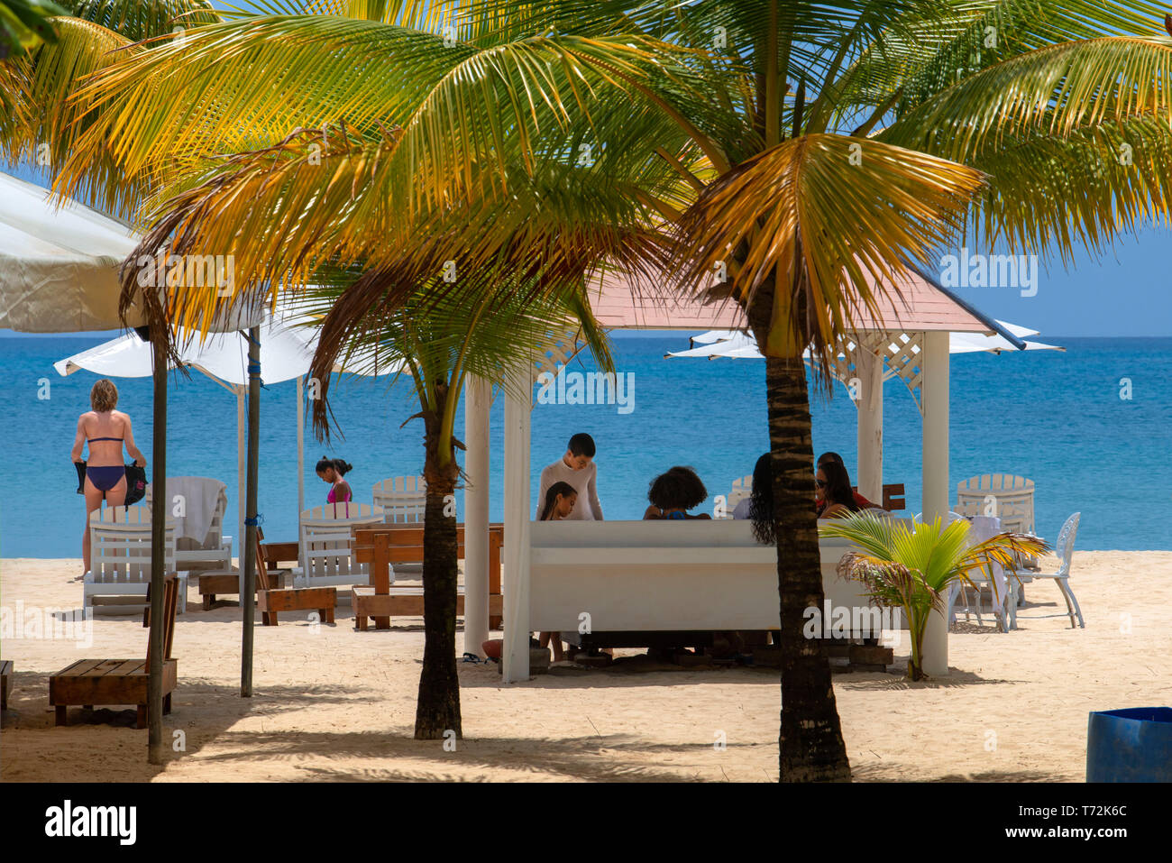 Tourists palms and beach, Corn Island, Caribbean Sea, Nicaragua