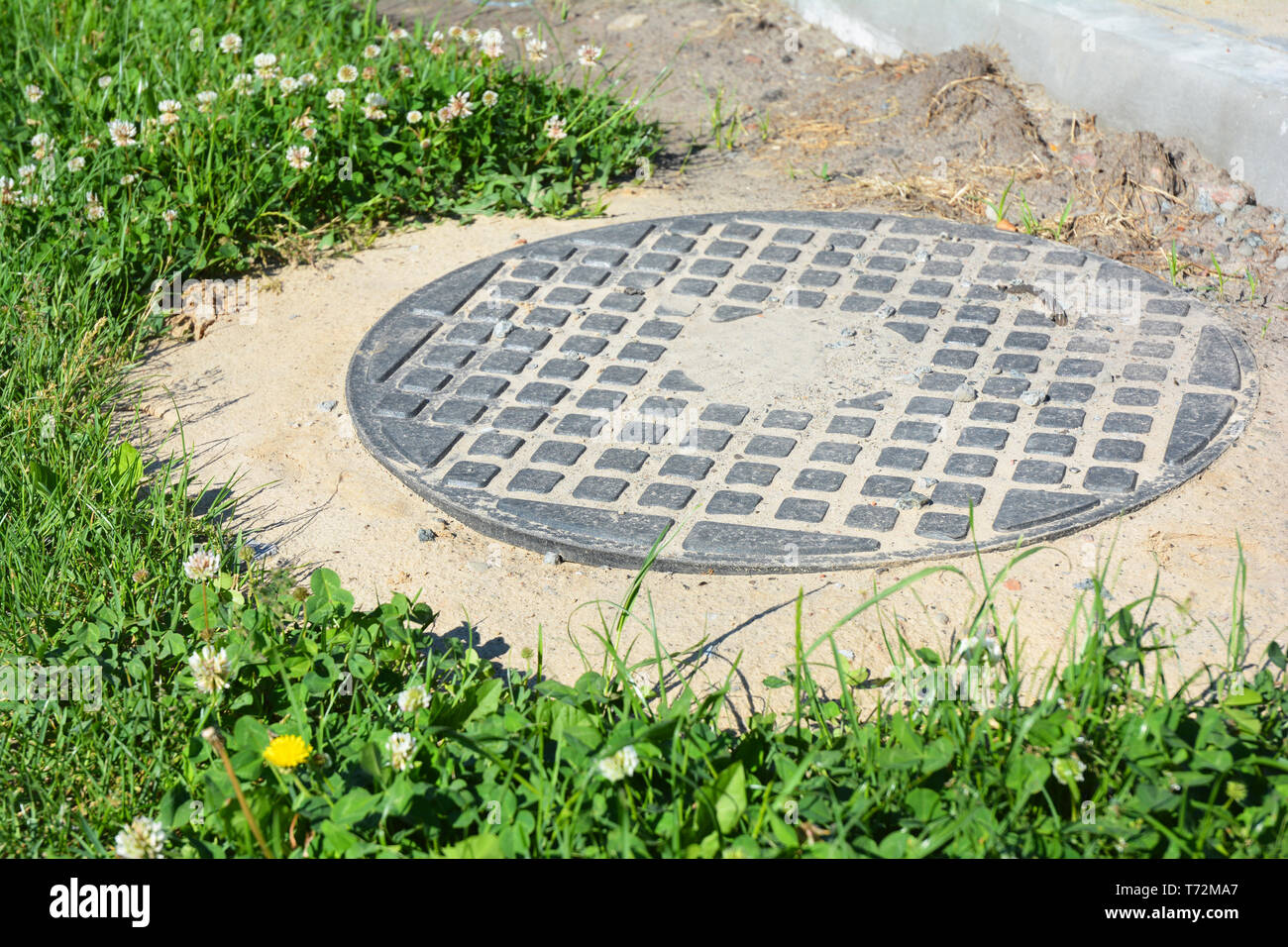 Septic manhole cover with copy space. Stock Photo