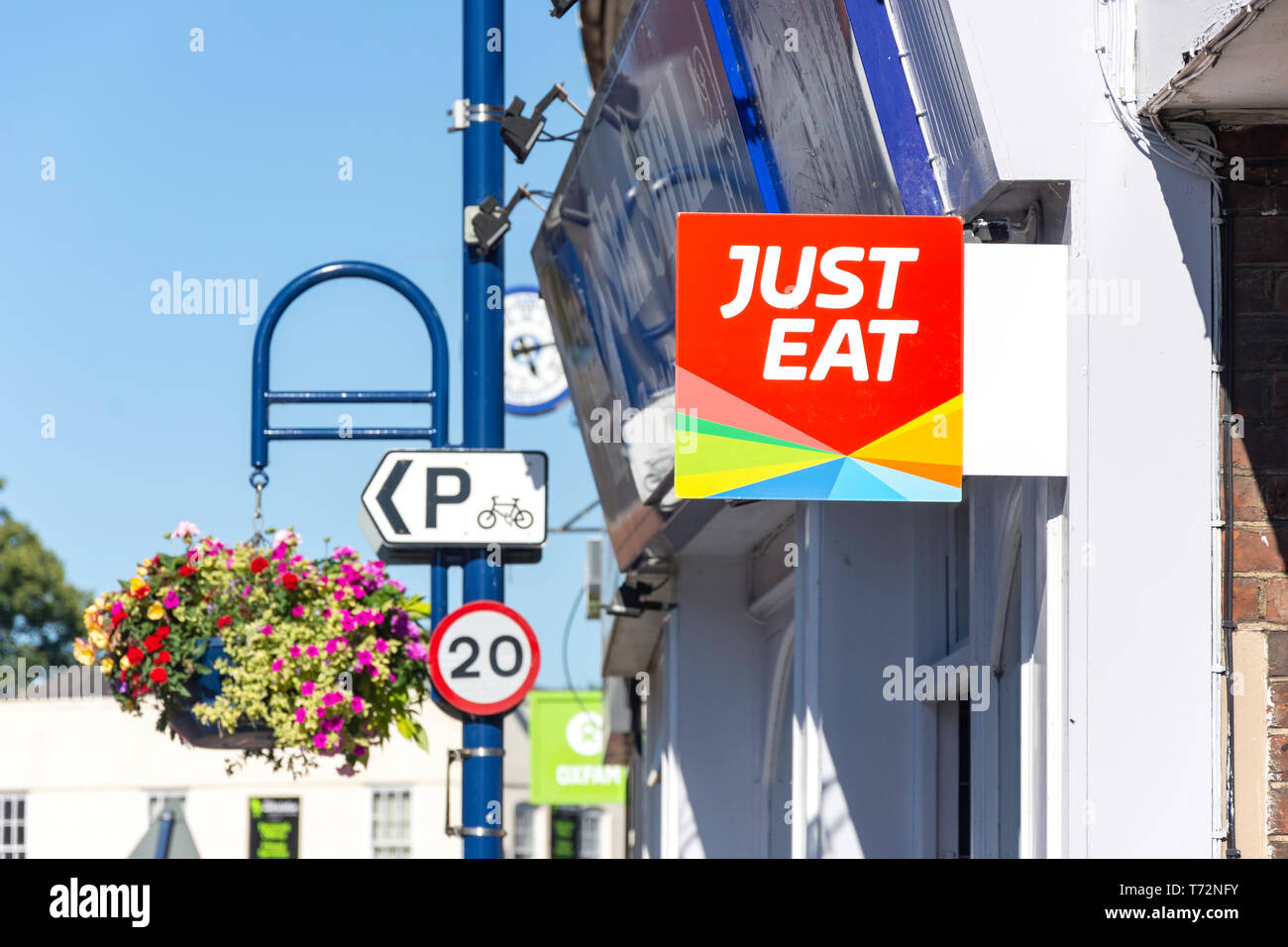 'Just Eat' sign on restaurant, Market Square, St Neots, Cambridgeshire, England, United Kingdom Stock Photo