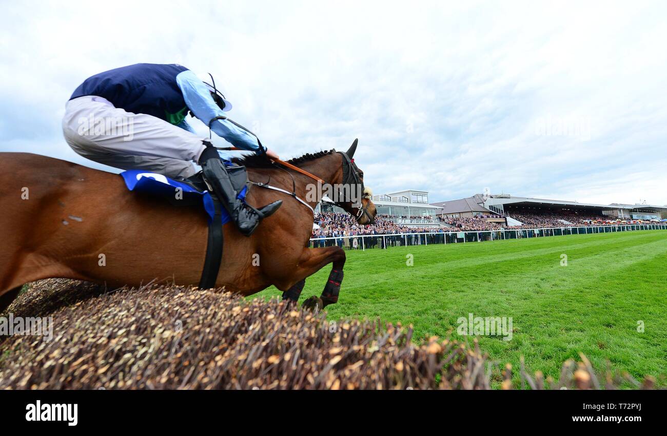 Flirting Lesa and Niall Redmond jump the last to win the Bishopcourt Cup Hunters Steeplechase during day four of the Punchestown Festival at Punchestown Racecourse, County Kildare, Ireland. Stock Photo