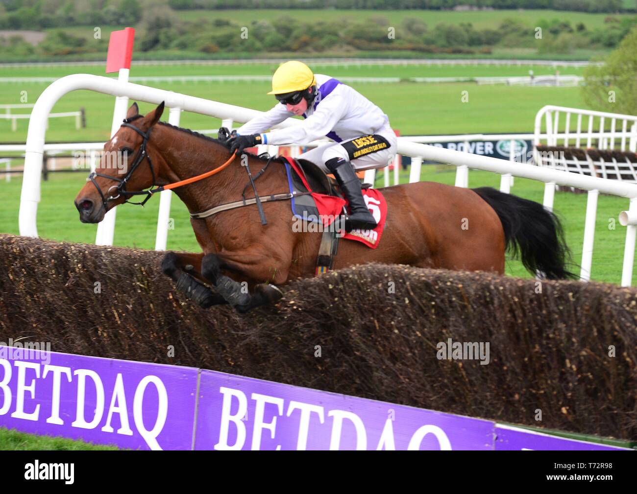 Moyhenna and Denis Hogan jump the last to win the Glencarrig Lady Mares Handicap Steeplechase during day four of the Punchestown Festival at Punchestown Racecourse, County Kildare, Ireland. Stock Photo