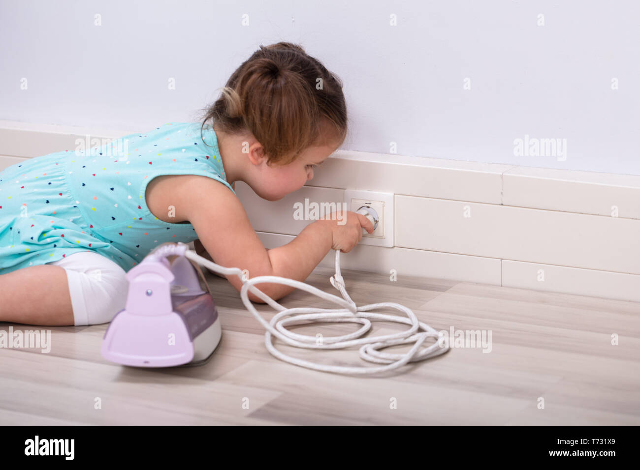 Safety plug child hires stock photography and images Alamy
