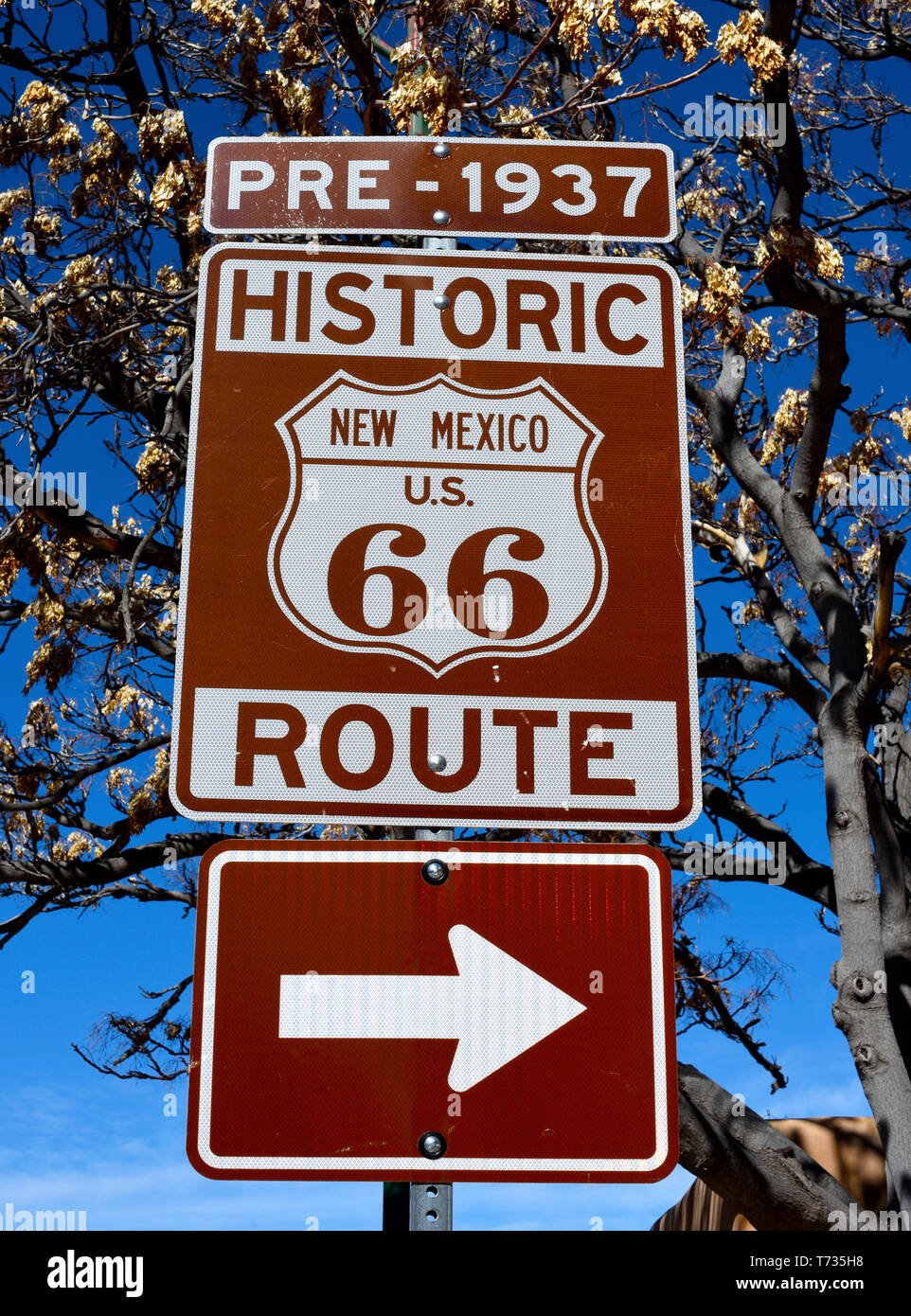 A street sign marks the route of historic highway Route 66 in Santa Fe, New Mexico Stock Photo