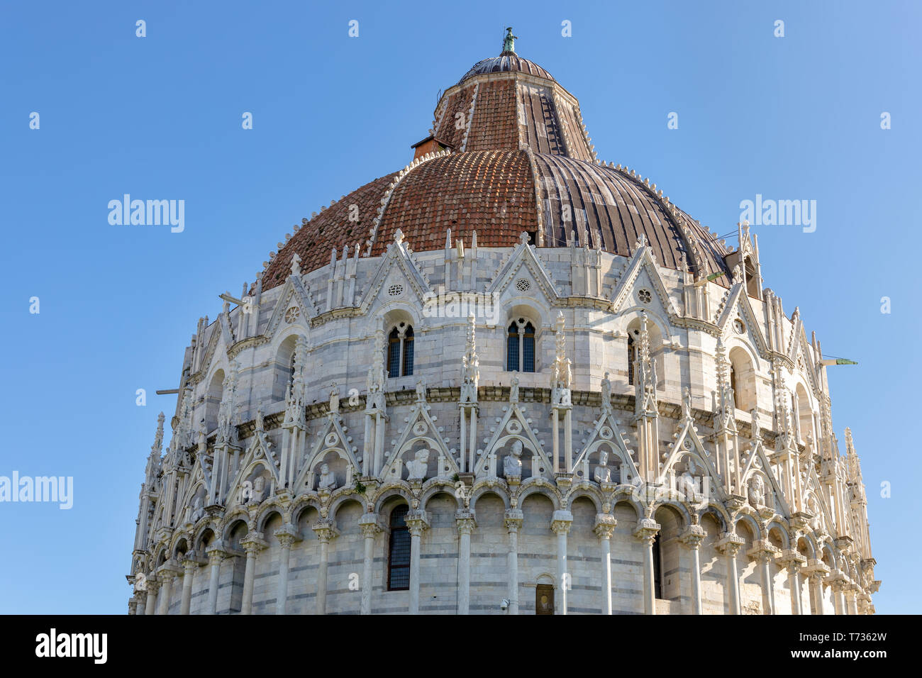 PISA, TUSCANY/ITALY  - APRIL 18 : Exterior view of the Baptistery in Pisa Tuscany Italy on April 18, 2019 Stock Photo