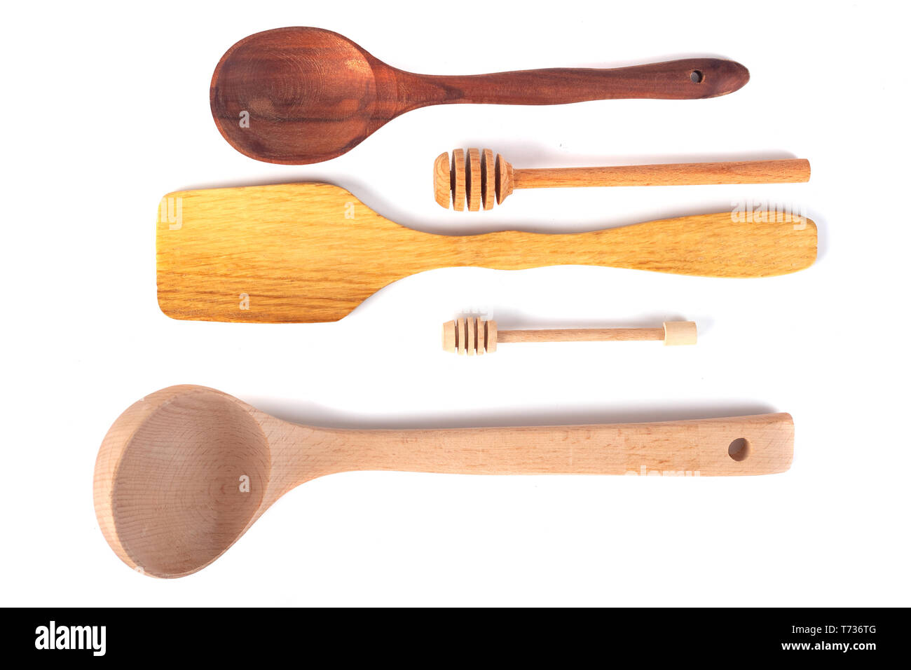 Various wooden kitchen tools isolated on white background, top view ...