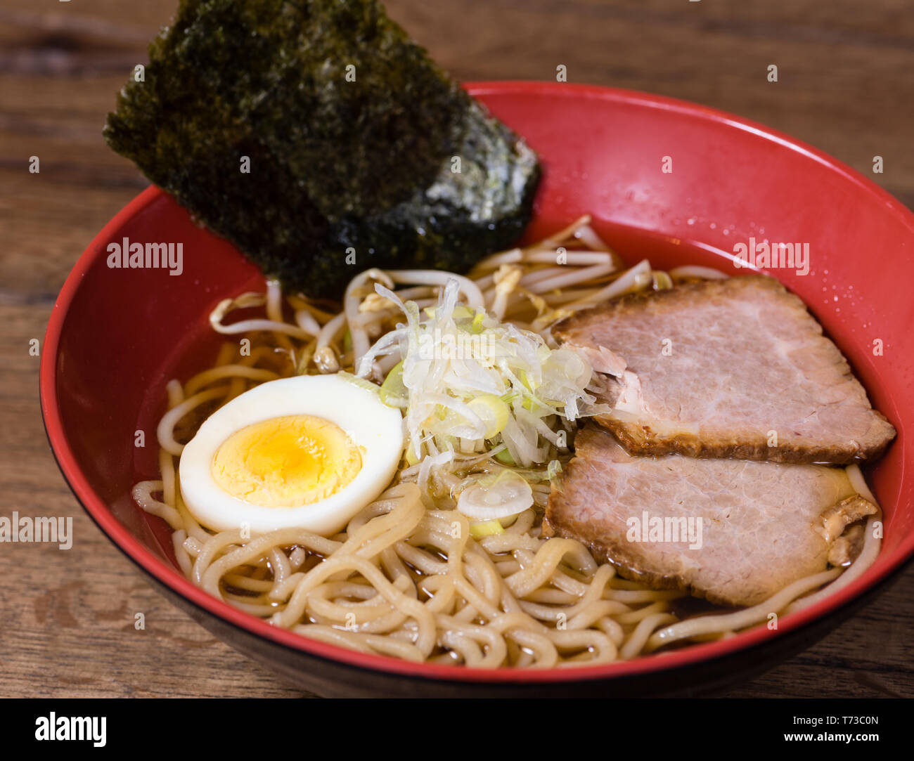 Ramen Shoyu, with chicken broth, stewed pork, onions, algae, sesame oil, soybean sprouts, egg in