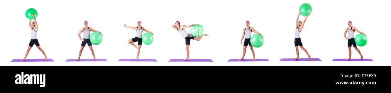 Man with swiss ball doing exercises on white Stock Photo - Alamy