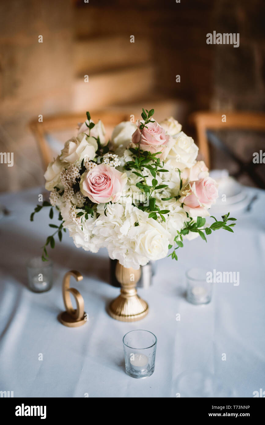 Table setting at wedding reception. Wedding flowers. Stock Photo