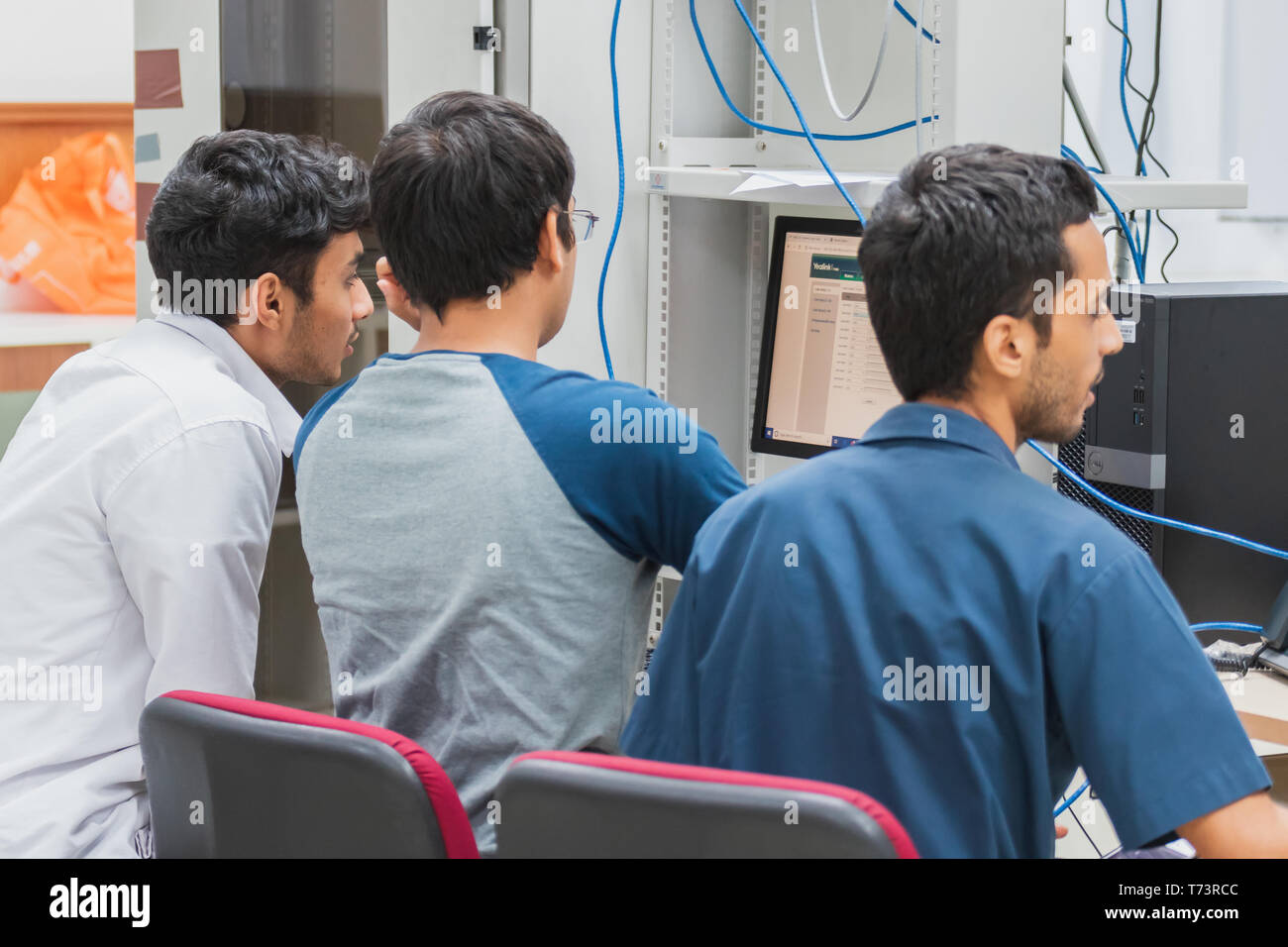 Group of Indian university computer engineering students working and ...