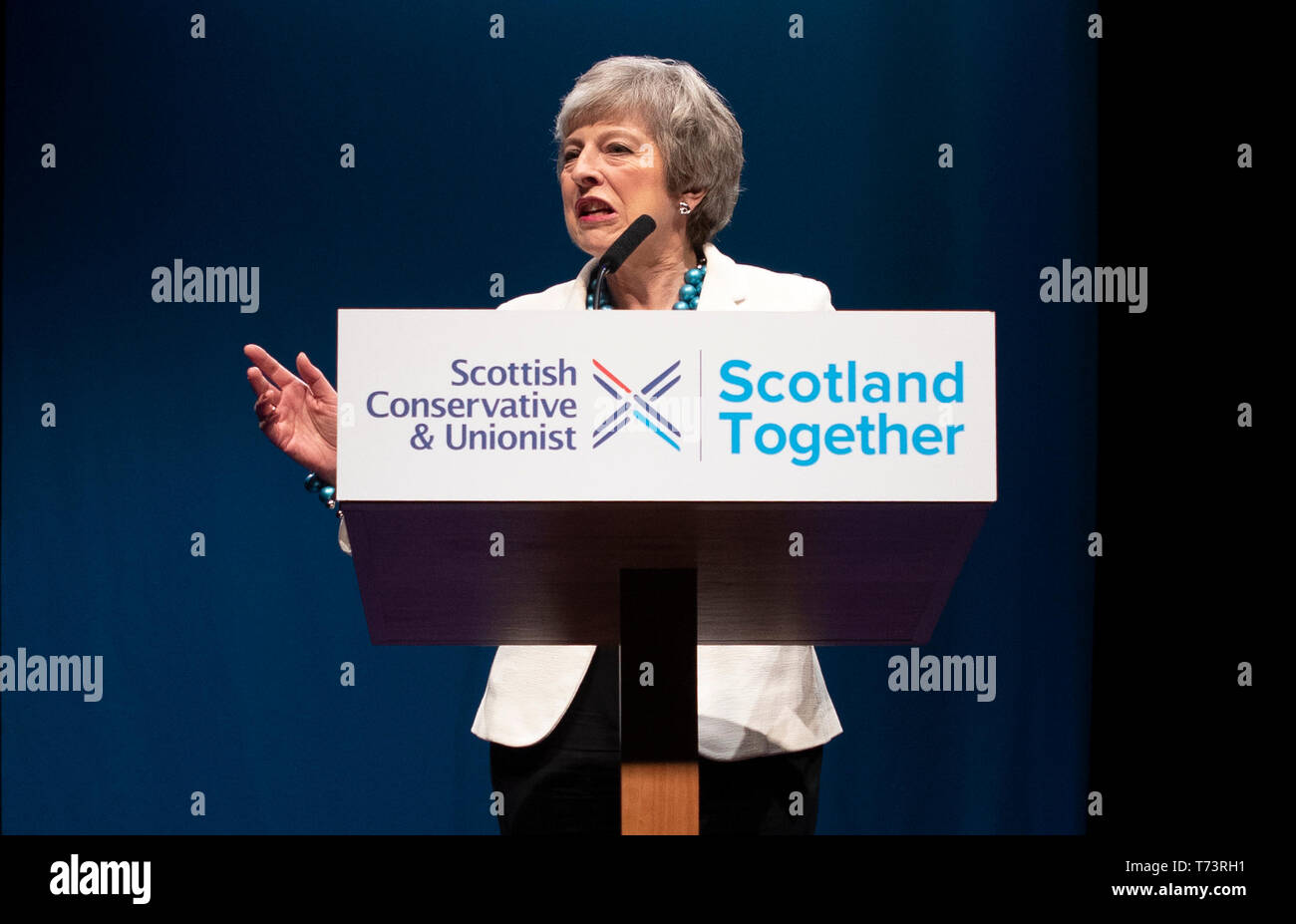 Prime Minister Theresa May addresses delegates during the Scottish Conservatives' annual party conference at the Aberdeen Exhibition and Conference Centre. Stock Photo