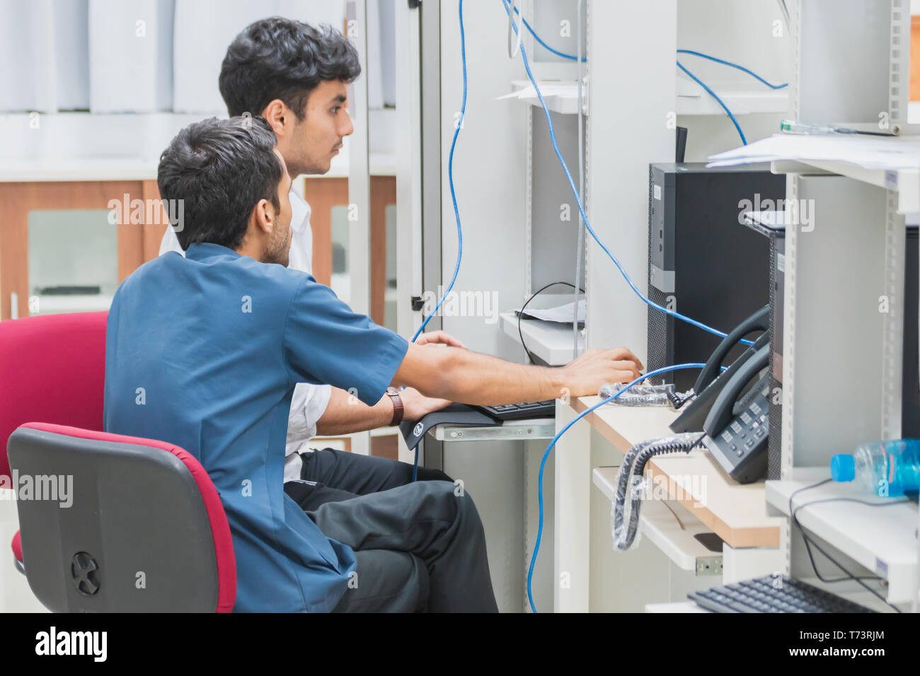 Group of Indian university computer engineering students working and ...