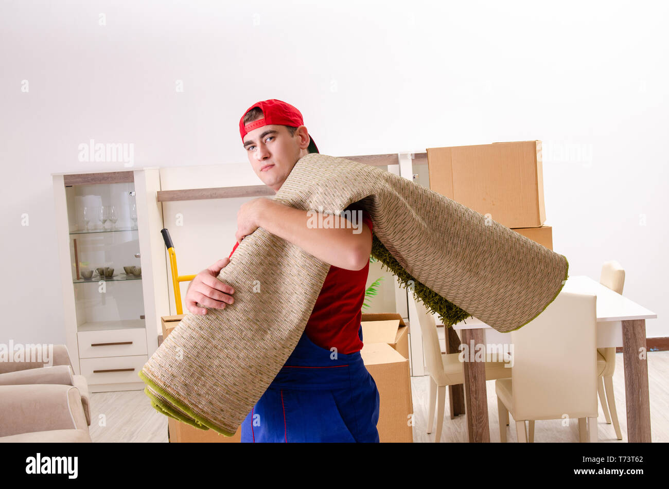Young contractor boxes working hi-res stock photography and images - Alamy