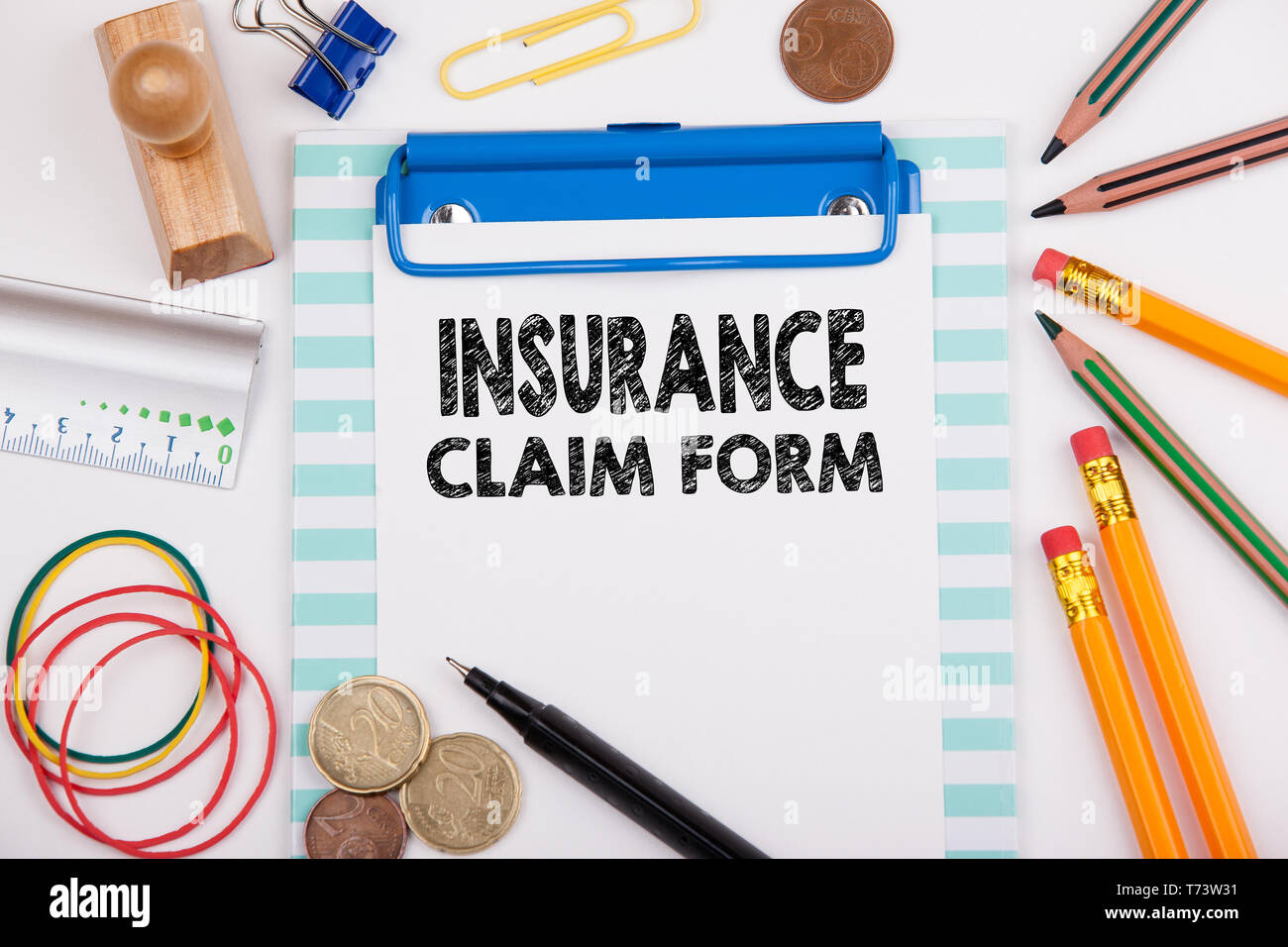 Insurance Claim Form. Office desk with stationery Stock Photo Alamy