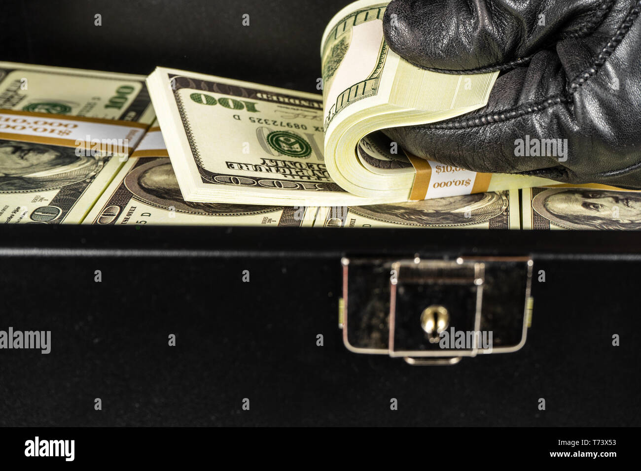 Briefcase Full 100 Dollar Bills High Resolution Stock Photography and
