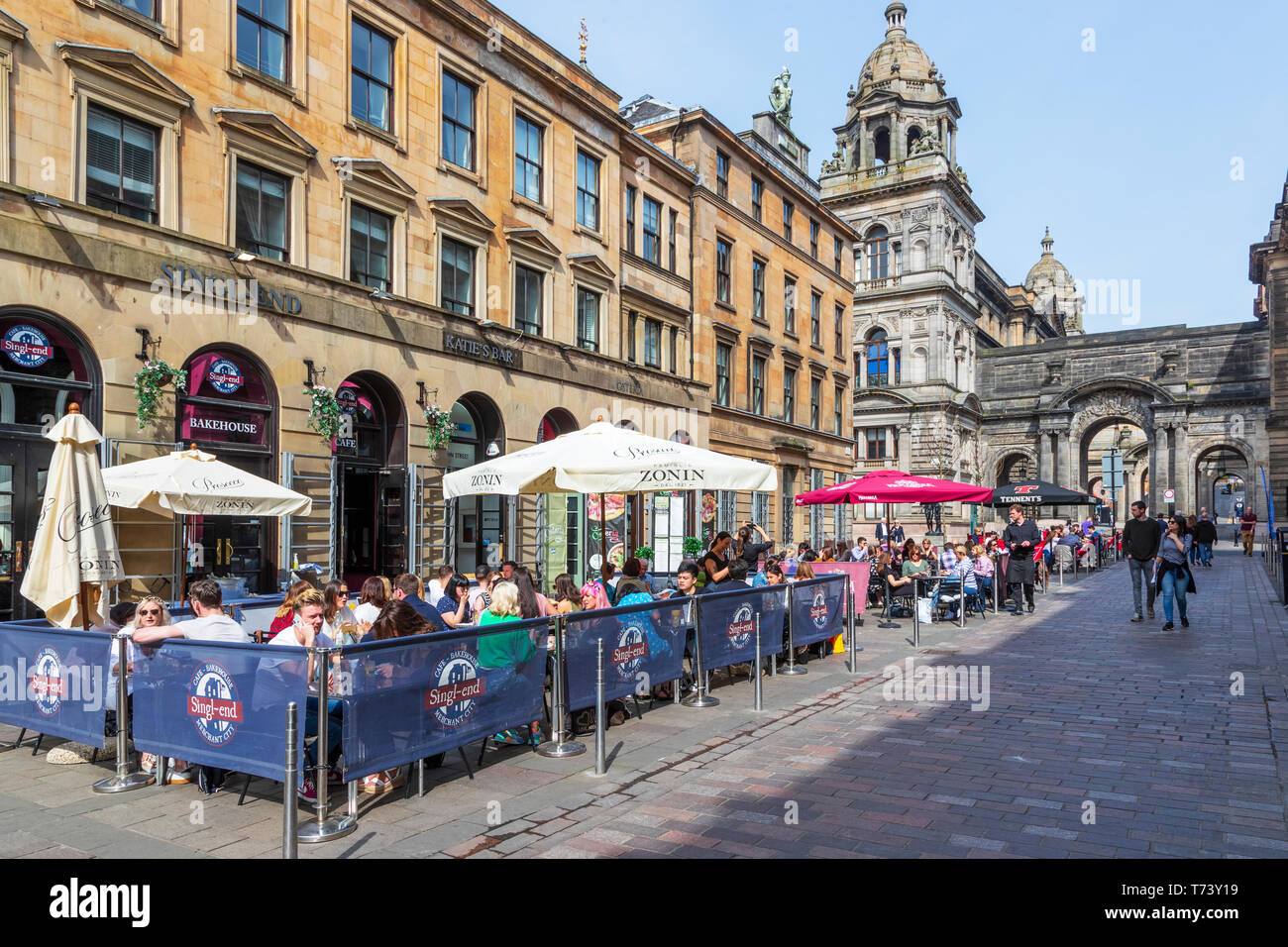 Customers eating outdoors at restaurants and cafes in Glasgow's Italian centre, John Street, Glasgow, Scotland, UK Stock Photo