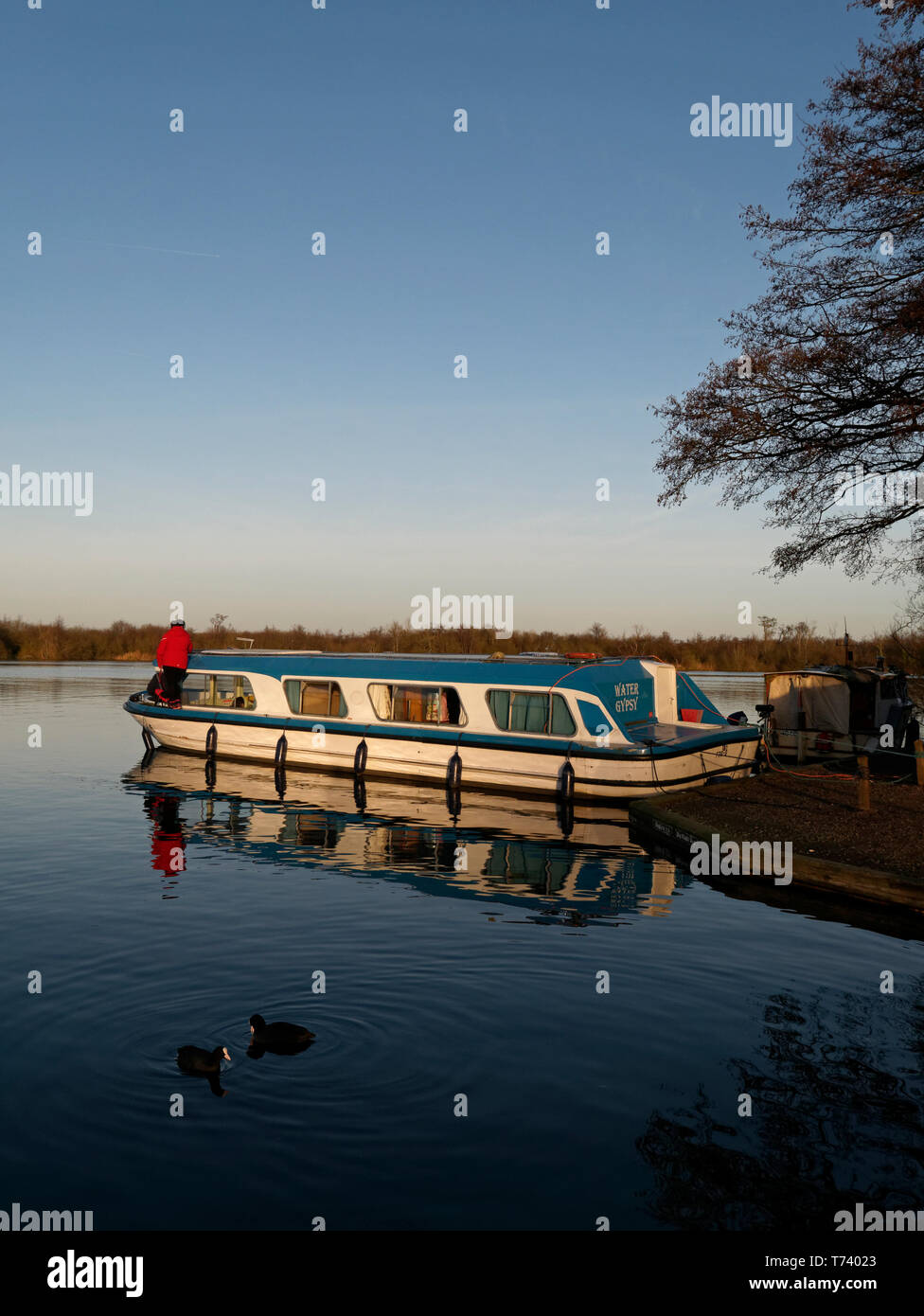 Holiday Boating on The Norfolk Broads in December, at Malthouse Broad, Ranworth, Norfolk, England, UK Stock Photo