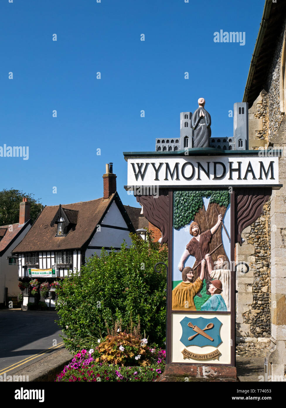 The Town Sign and  Ancient Green Dragon Pub in The Town of Wymondham, Norfolk, England, UK Stock Photo