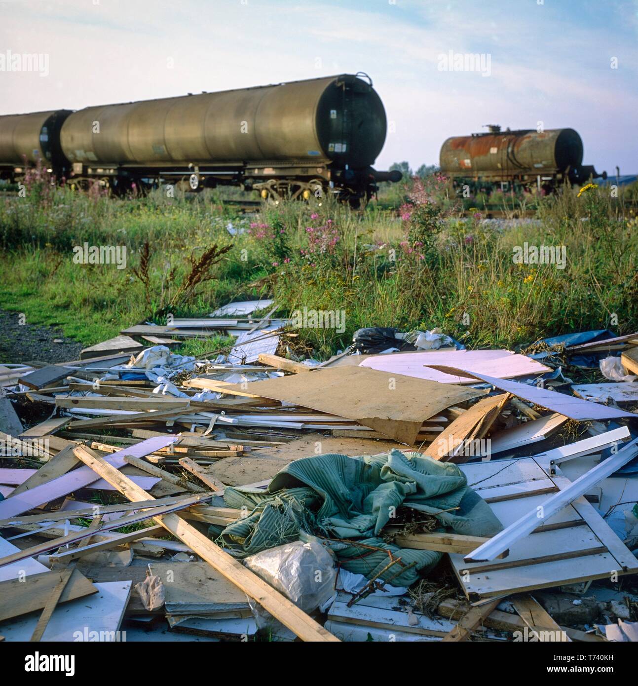 Waste tip next to tankers Stock Photo