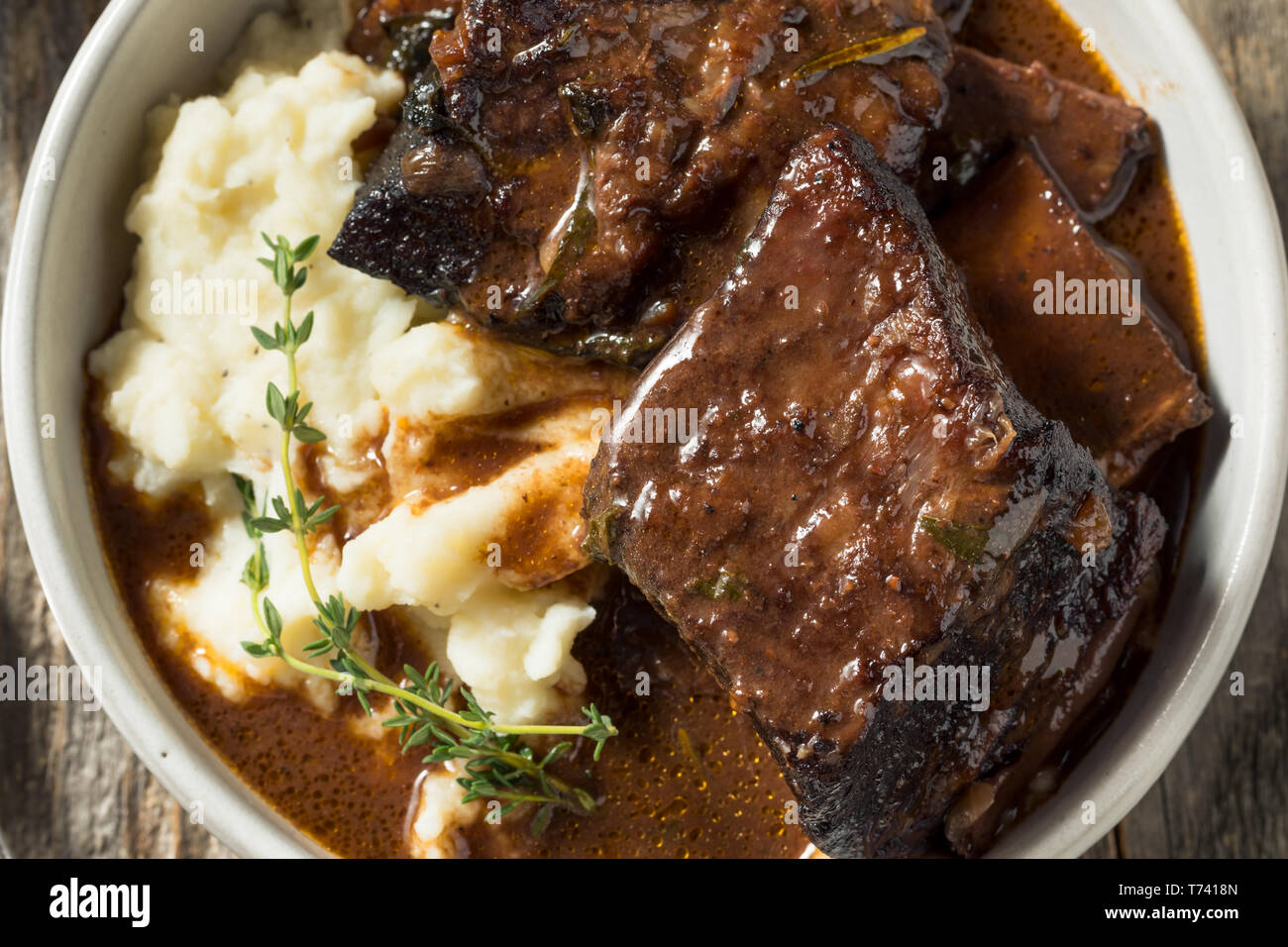 Homemade Braised Beef Short Ribs with Gravy and Potatoes Stock Photo