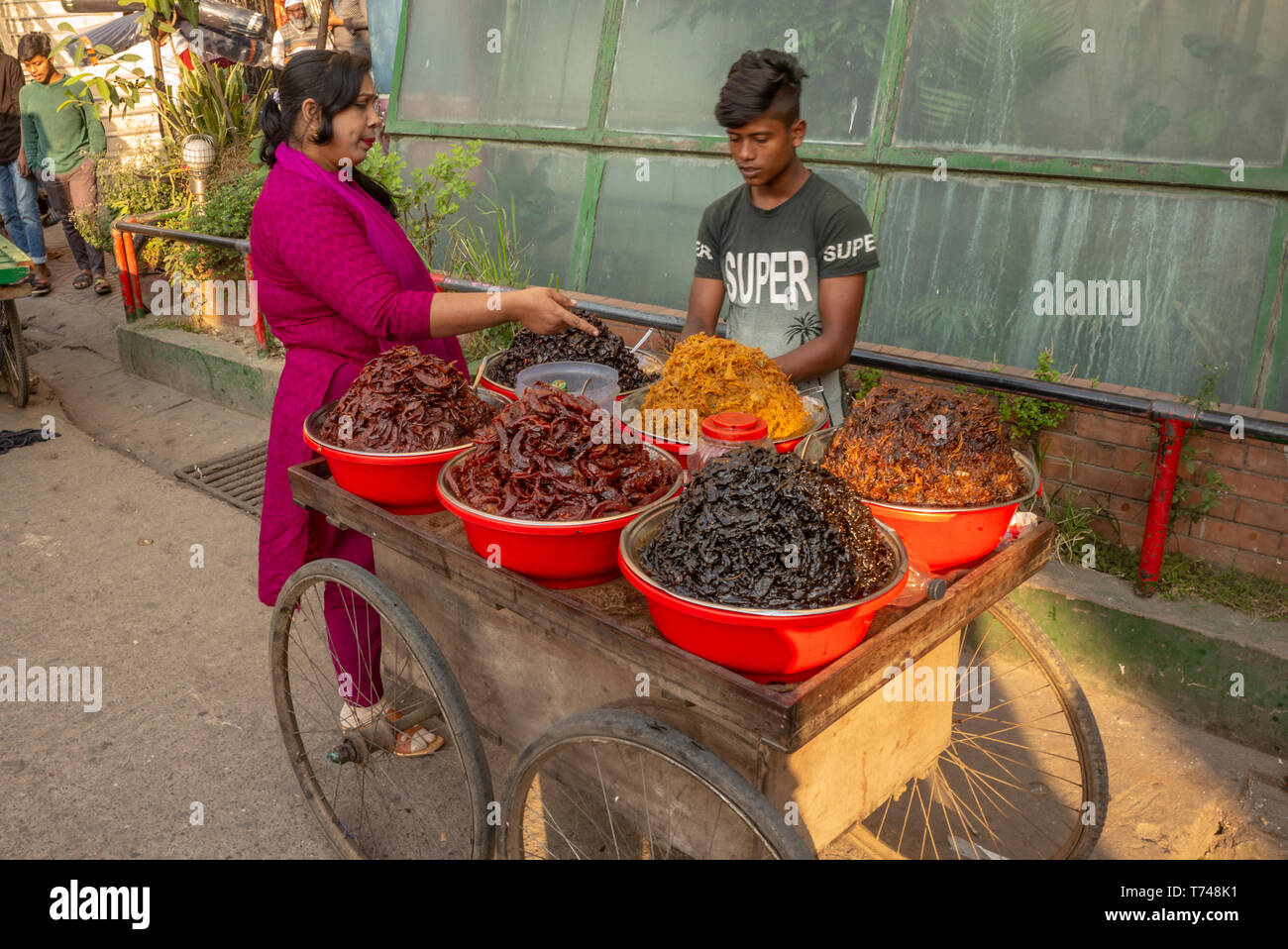 Dried fruit for sale from carts on the street in old Dhaka, Bangladesh Stock Photo Alamy