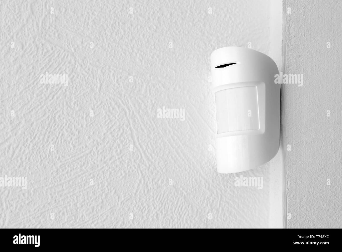 Modern motion sensor indoors Stock Photo Alamy