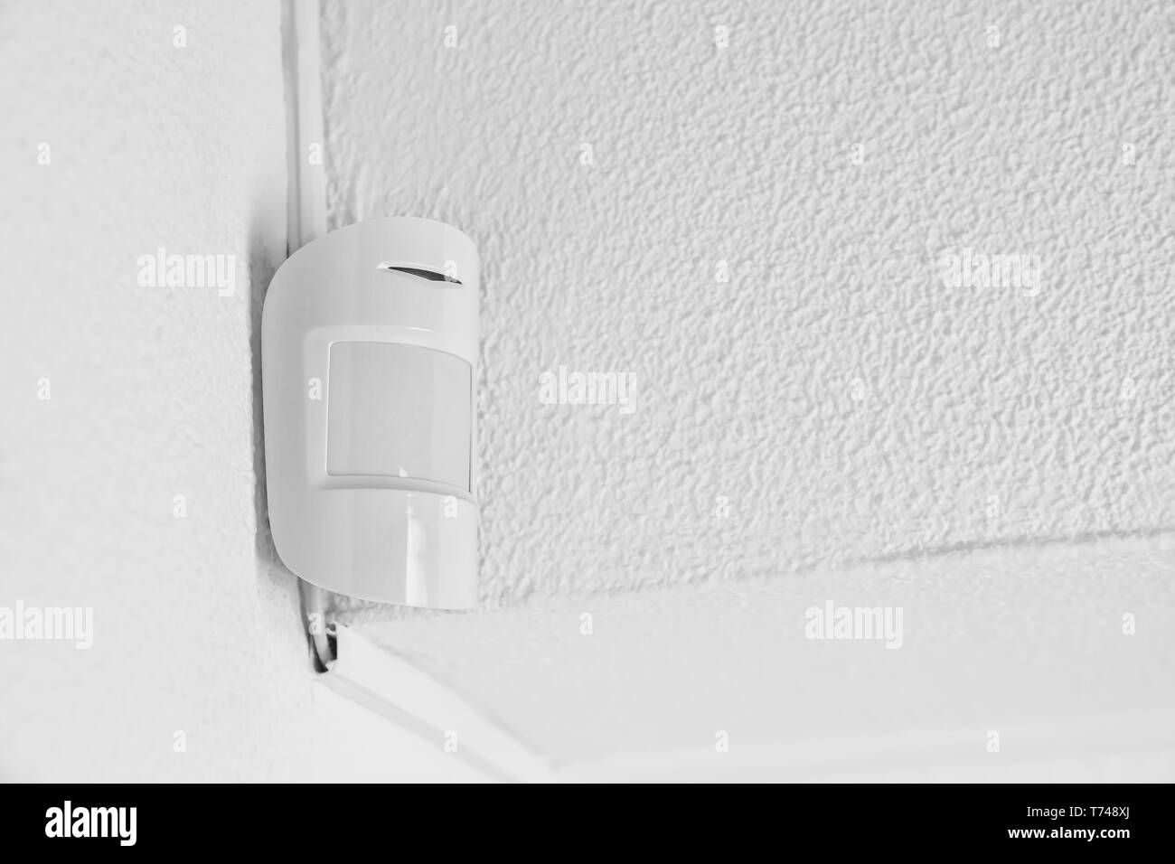 Modern motion sensor indoors Stock Photo Alamy