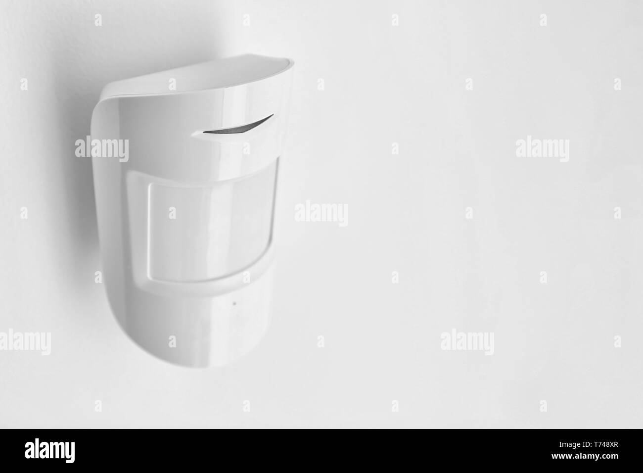 Modern motion sensor indoors Stock Photo Alamy