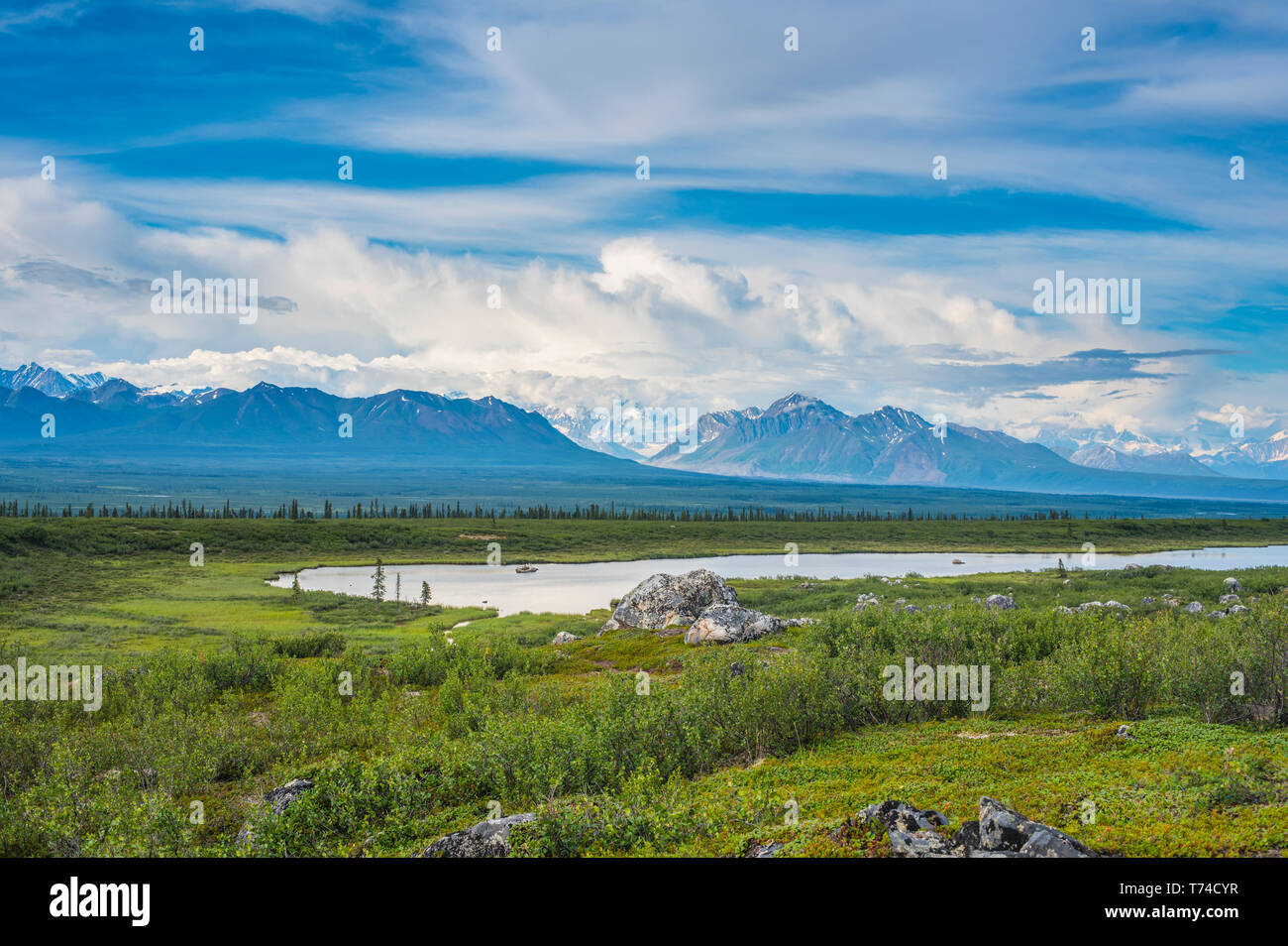 Summer clouds over the Alaska Range as seen from the Alaska Highway in