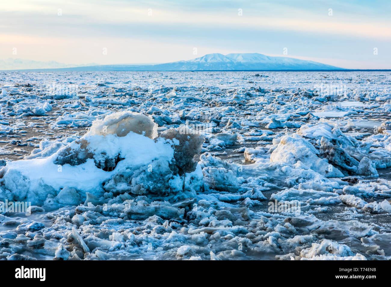 Looking west across the Knik Arm, sea ice in winter choking the Cook ...