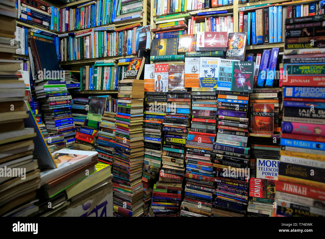 Bookshelf at a bookshop at Nilkhet Book Market. Dhaka, Bangladesh Stock Photo