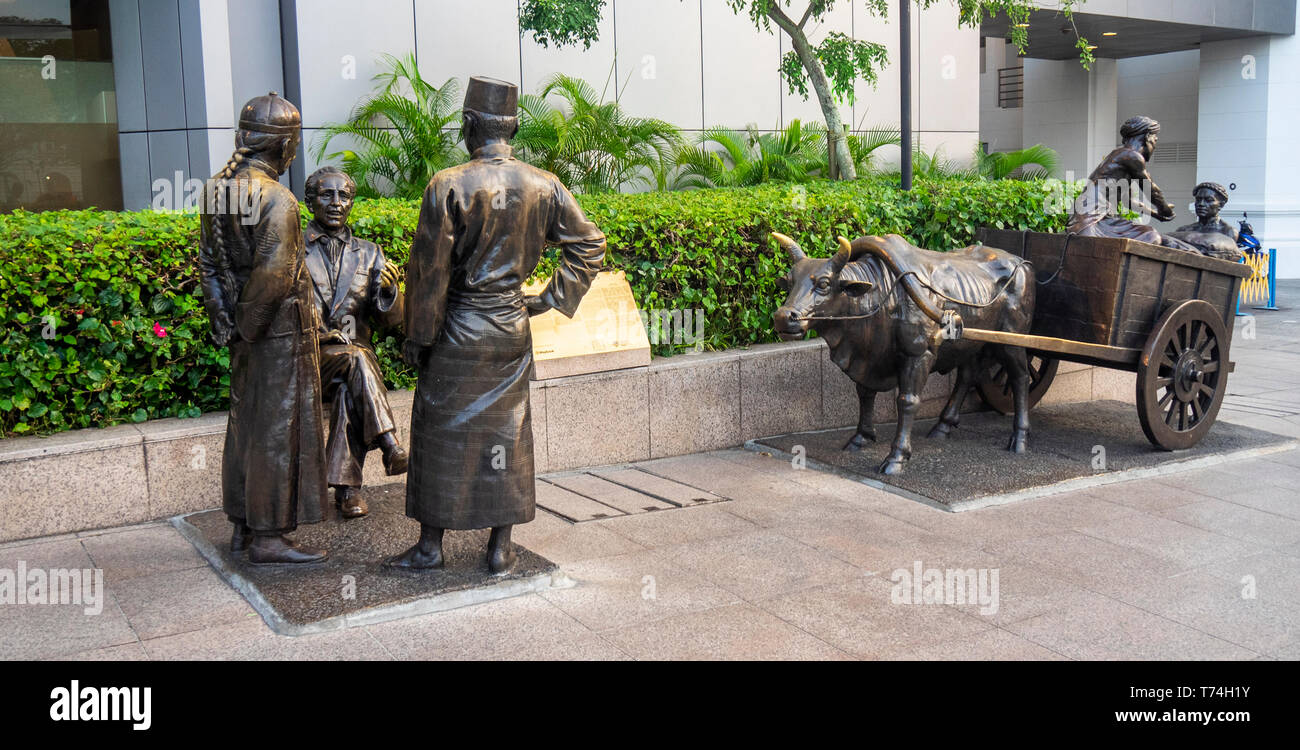 Bronze sculpture The River Merchants by Aw Tee Hong sculptor along the