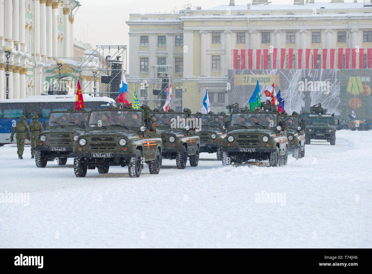 SAINT-PETERSBURG, RUSSIA - JANUARY 24, 2019: The flag group on military vehicles UAZ-469 on Palace Square. Dress rehearsal for the military parade in  Stock Photo