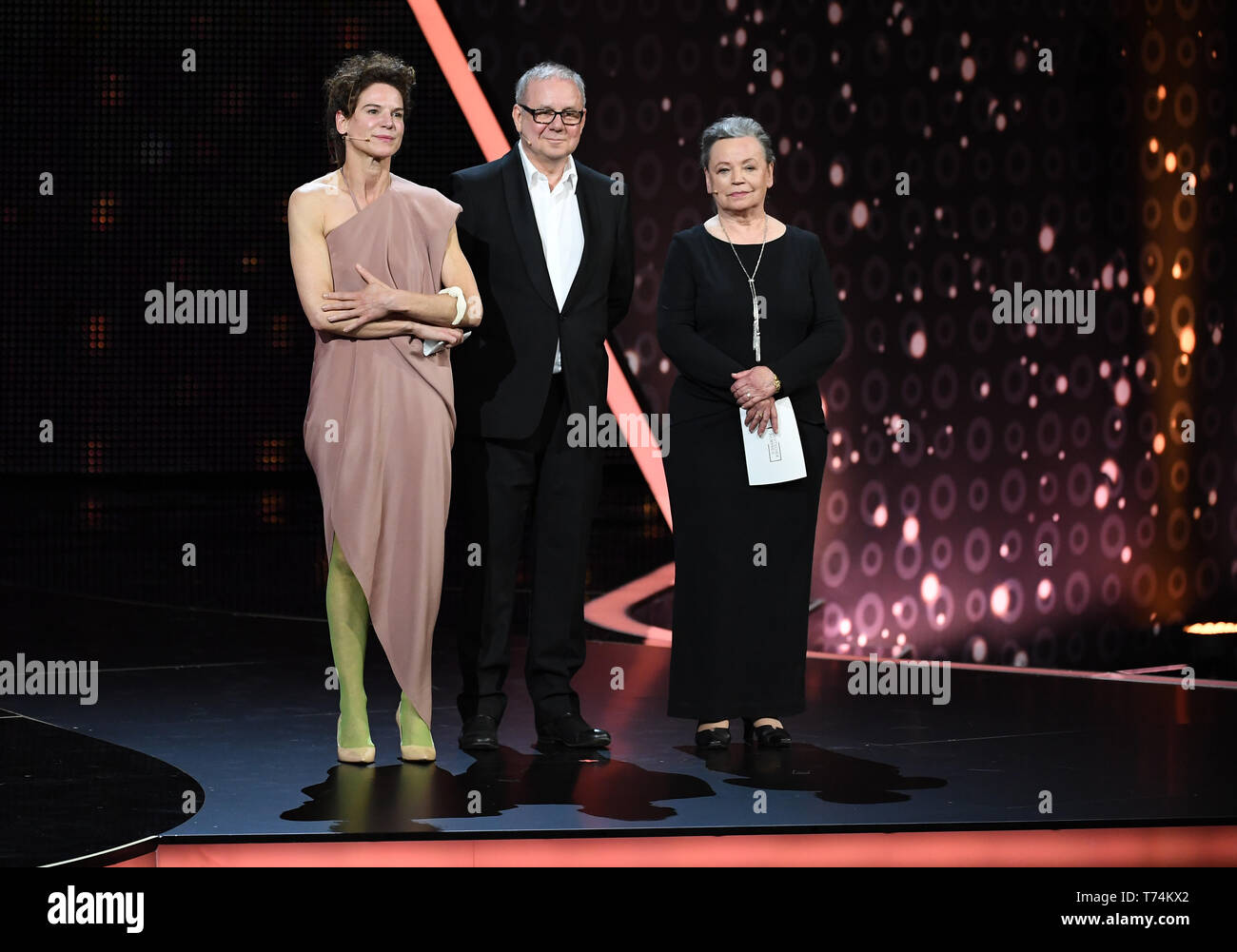 Berlin, Germany. 03rd May, 2019. The actors Ursula Werner (r), Bibiana Beglau and Joachim Krol, give the laudatio in the category 'Best Director' at the 69th German Film Award 'Lola'. Credit: Britta Pedersen/dpa-Zentralbild/dpa/Alamy Live News Stock Photo