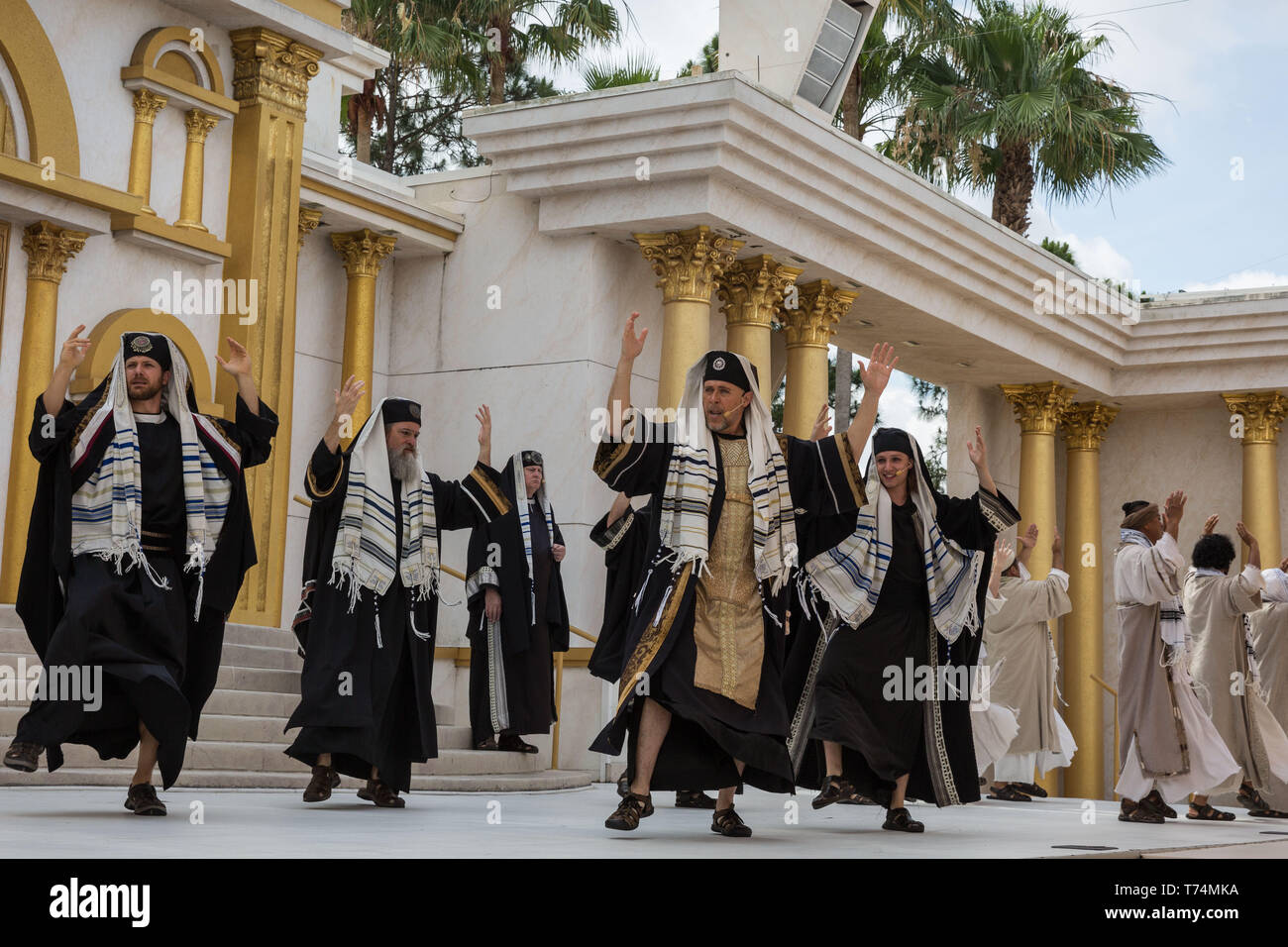 Orlando, Florida, USA. 3rd May, 2019. Actors dance during the ''Jesus At The Temple'' performance at The Holy Land Experience (HLE) in Orlando, Florida. The theme park, owned by the Trinity Broadcasting Network, recreates the architecture and themes of the ancient city of Jerusalem in 1st-century Judea. HLE is a non-denominational Christian living biblical museum and church. The park opened in February 2001. Credit: Tracy Barbutes/ZUMA Wire/Alamy Live News Stock Photo